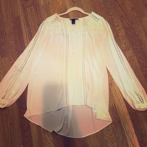 Cream colored blouse